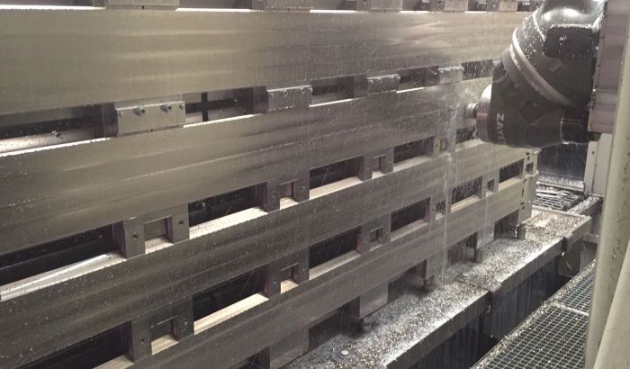 Protective shields for nuclear transport containers